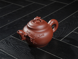 Why is Yixing Purple Clay Teapot highly esteemed in the world of tea culture?