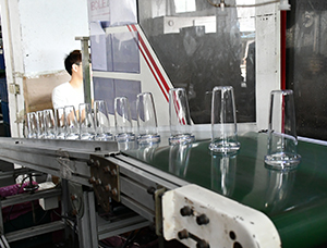 How are plastic water cups produced