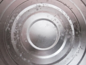 Why is it not recommended to use saltwater to clean the inner liner of stainless steel insulated cups